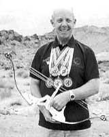 The author with a Groves/Merlin Flight bow in Nevada, 1997